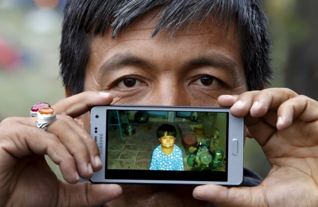 Немад из Афганистана, со своим сыном Нуре