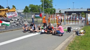 Протест в Бельгии: Caterpillar обвиняют в участии в разрушениях